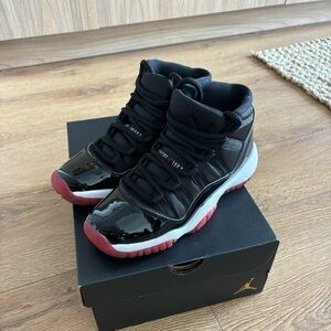 Air Jordan 11 Retro GS ‘Bred’ 2019 - Youth 5.5 (women’s 7)